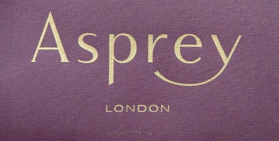 Asprey logo on tight weave (sunbrella type) material. Detail view of very large blind. Asprey logo on tight weave (sunbrella type) material. Detail view of very large blind.